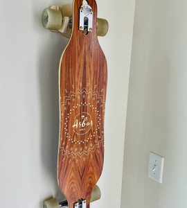wall mounted storage rack for a skateboard or longboard